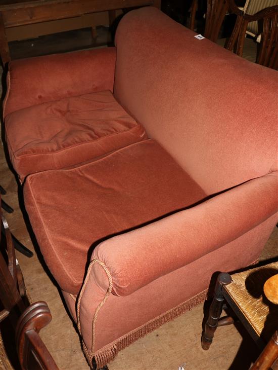 Pink settee, on claw and ball feet, with cushions